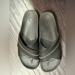 OluKai Black Slide Sandals with Stitch Accent
